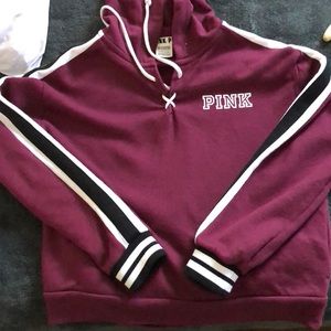 A maroon / burgundy sweater